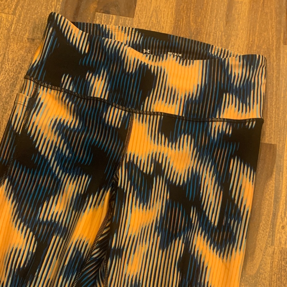 Under Armour compression workout tights. Phone pocket on right side. Medium.